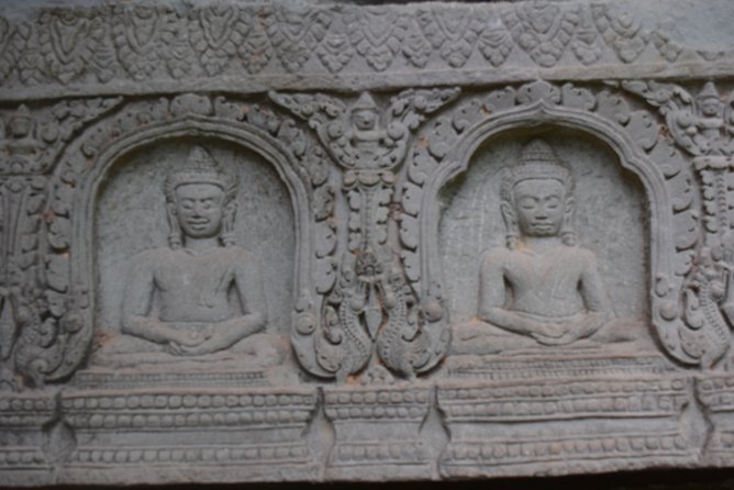 2-D Angkor temple tour with one sunrise in A/C vehicle and guide. - Day one: Ta Prohm, Pre Rup, and the red sandstone temples