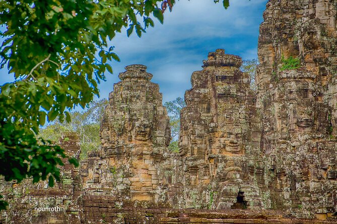 2-Day Angkor Wat, Banteay Srei & Floating Village Kampong Pluk - Angkor Thom brings faces, kings, and public ceremony