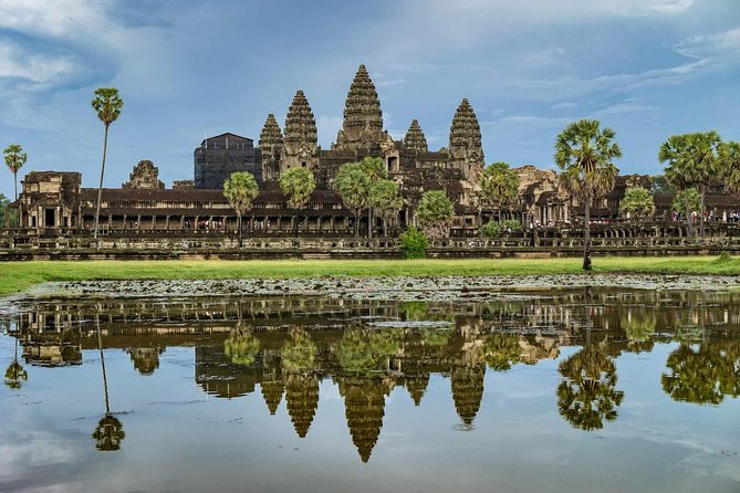 2 Days Discover Angkor Wat Complex and Cambodia's Villages Tours - Ta Prohm, where trees press into the ruins