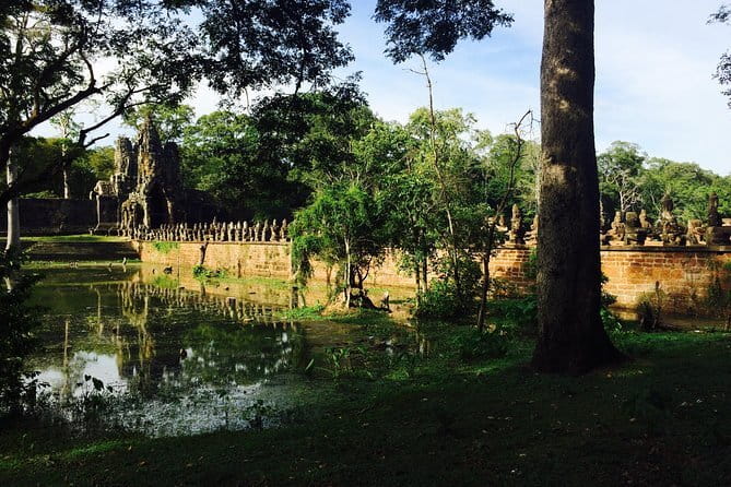 A Day Angkor Park Tours - Private English Speaking Tour Guide - Ta Prohm brings the jungle into the ruins