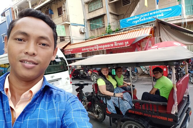 A Full Day Tour for Royal Palace, S21, Killing Fields & More - Central Market ends the day on ordinary city life