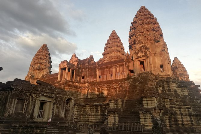 Afternoon Angkor Wat Private Tour with Sunset - Ta Prohm and the trees over stone