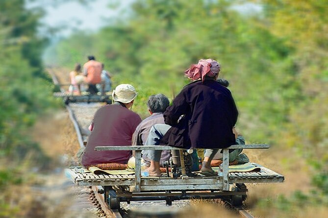 Afternoon tour to Original Bamboo train. Bat cave. Killing cave - Riding the original bamboo train at Ou Srauo Laou