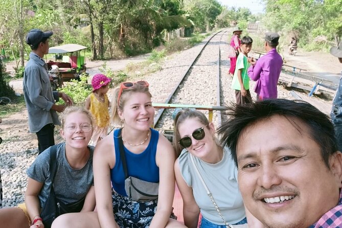 AfternoonTour.Bamboo train.killing cave with Secret bat cave - Crossing Battambang’s swinging bridge