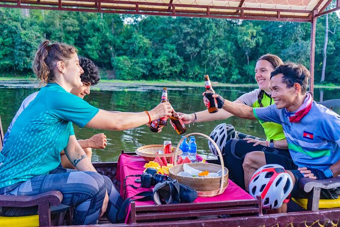 Angkor Bike & Gondola Ride at Twilight - The dragon boat ending on Angkor Thom’s moat