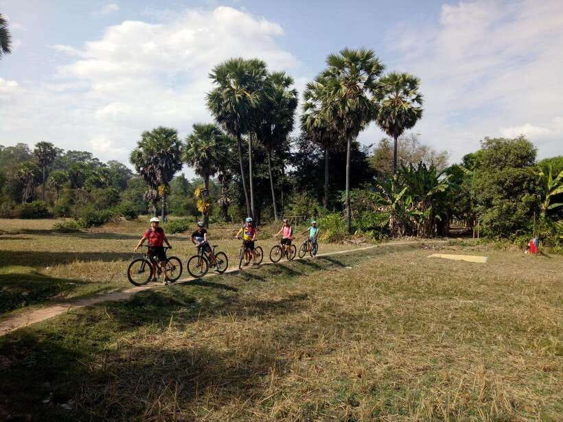 Angkor Cycling Tour - Bakheng Hill and Angkor Thom’s Ancient Wall