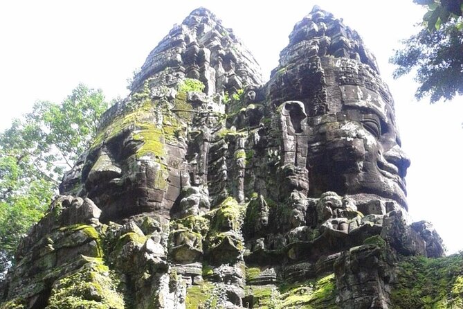 Angkor Full Day Tour All The Main Temples - Bayon’s smiling stone faces
