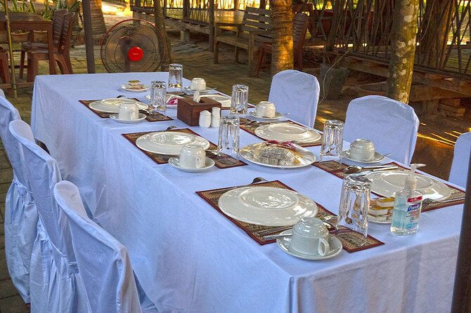 Angkor Sunrise Bike Tour - Breakfast & Lunch included - Bayon and its many stone faces