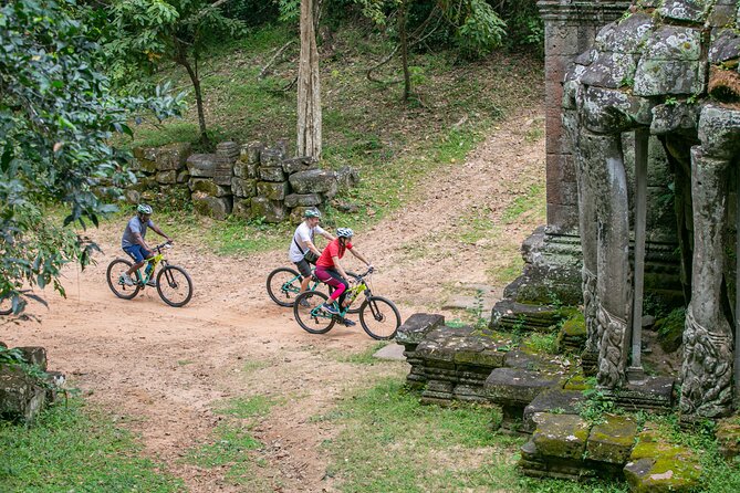 Angkor Sunrise Bike Tour / E-Bike or Tuk Tuk - Bayon and Angkor Thom: faces, gates, and a slower pace
