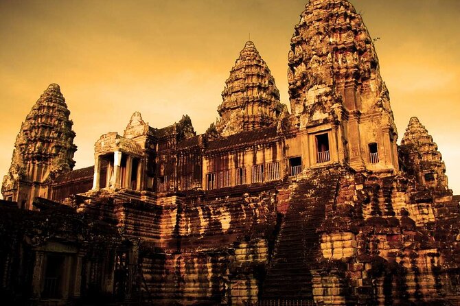 Angkor Thom Ta Prohm and Sunset in Angkor Wat Golden Hour Tour - Angkor Thom and the faces of Bayon