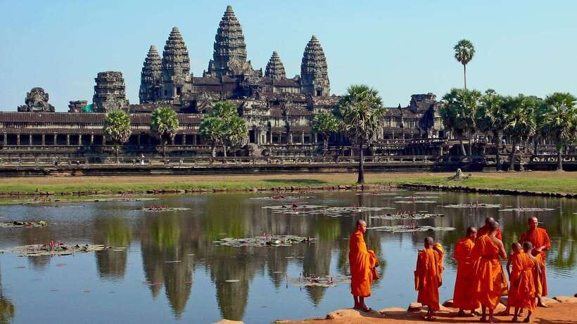 Angkor Wat: 2-Day Sunrise and Floating Village Tour - Angkor Thom brings faces, gates, and royal scale