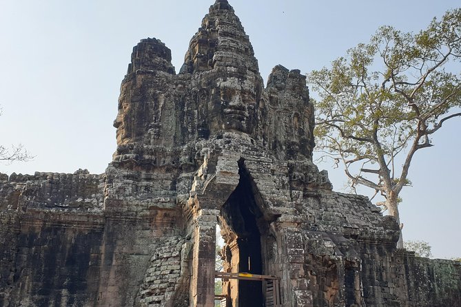 Angkor Wat Full Day Tour in Siem Reap Small-Group - Bayon’s carved faces and narrow corridors