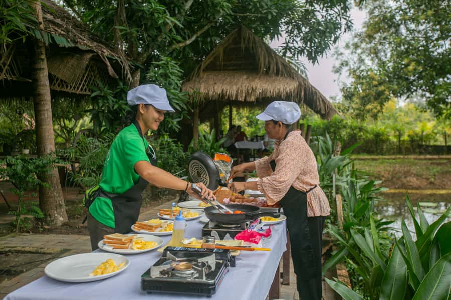 Angkor Wat: Guided Sunrise Bike Tour w/ Breakfast and Lunch - What the $55 price really covers