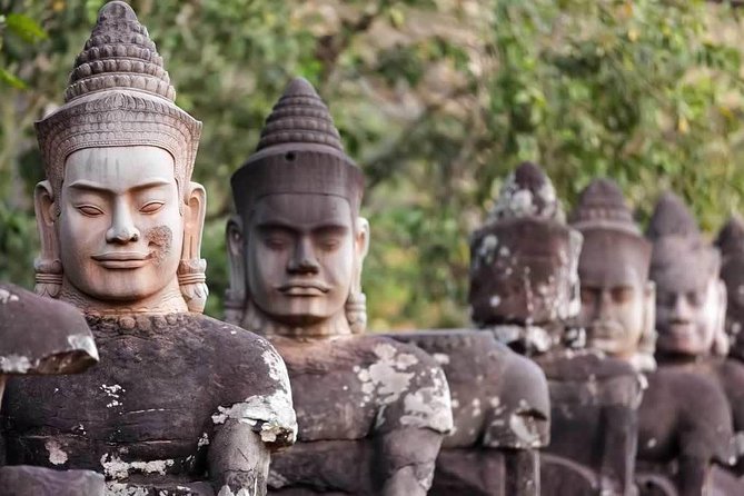 Stone faces on the gate towers at Angkor Thom