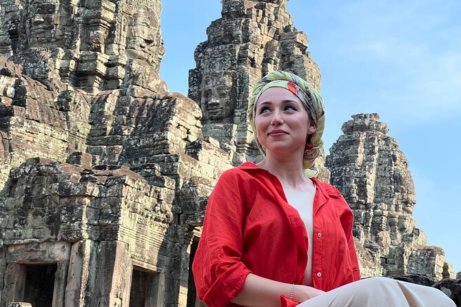 Angkor Wat Sunrise Tour By E-Bike Experience With Breakfast Included - Bayon’s stone faces