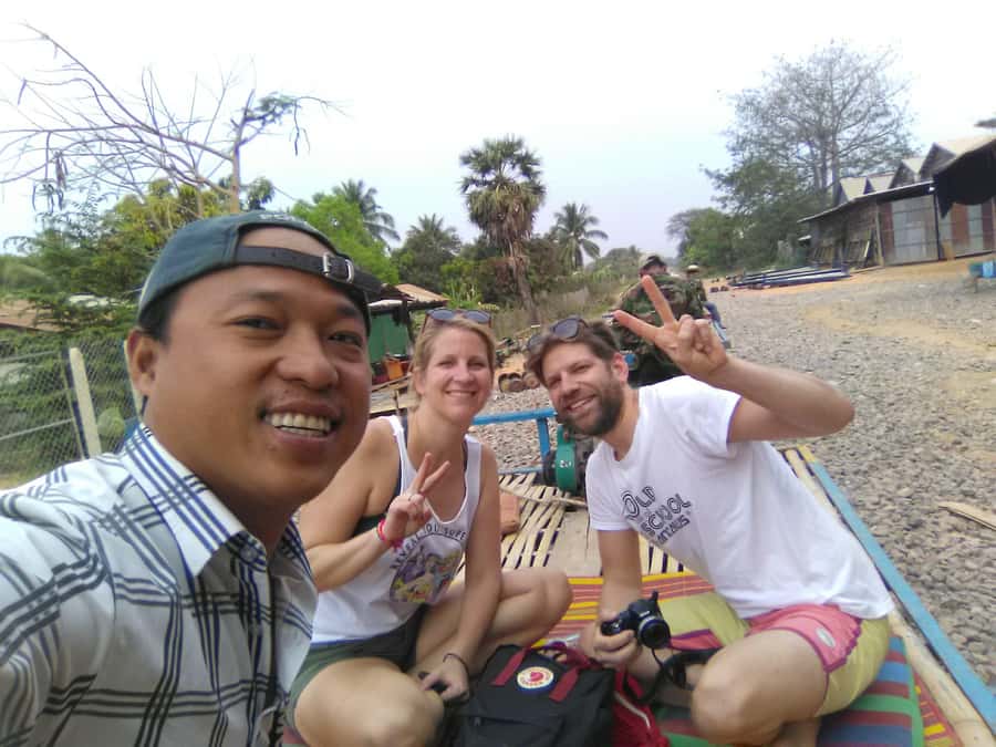 Battambang family tuktuk tour BambooTrain/Wat Banan/Bat cave - Riding the Bamboo Train through the countryside