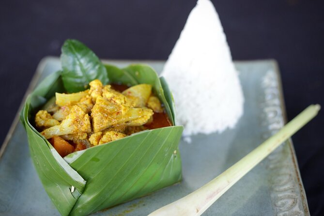 Cambodian Village Cooking Class - Learning in the open-air lakeside kitchen