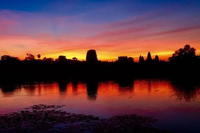 Explore Angkor Sunrise Spectacle a Full Day Temples Tour - Sunrise at Angkor Wat starts the day right