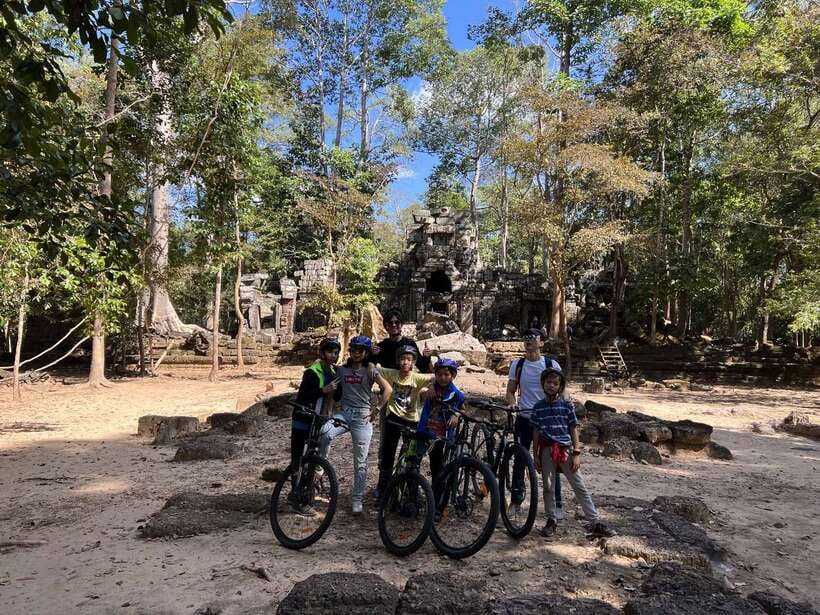 Explore Angkor Wat by Bike and Sunset - The final climb to Phnom Bakheng