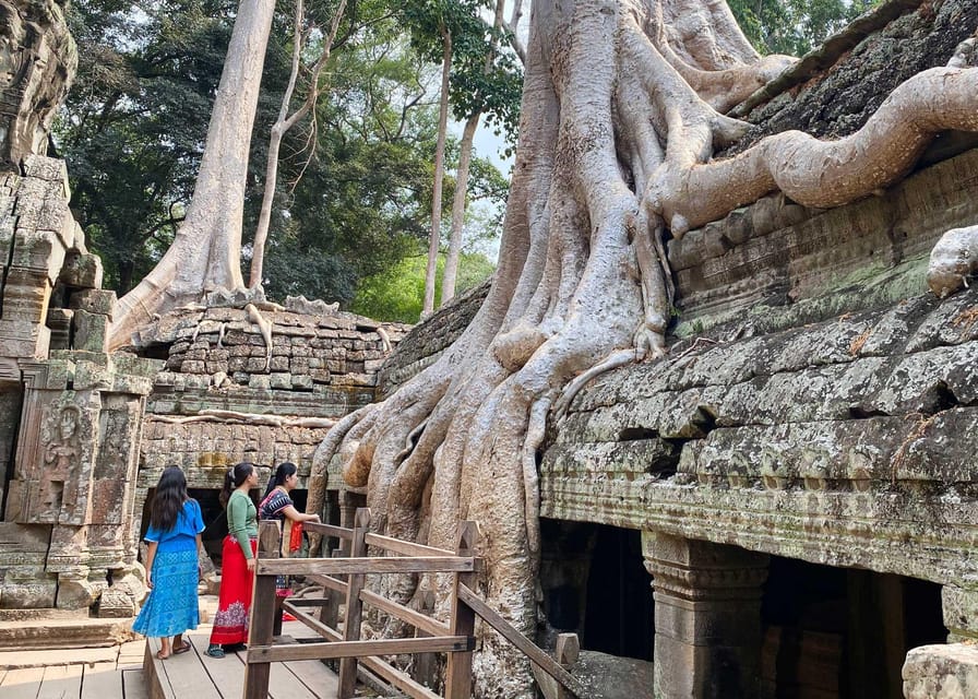 From Phnom Penh: Angkor Wat, Bayon, and Ta Prohm Day Trip - Bayon and the smiling stone faces