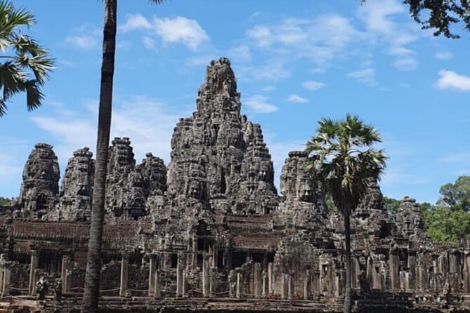 Full Day Angkor Wat Temples Tour with Pickup - What the guide adds to the day