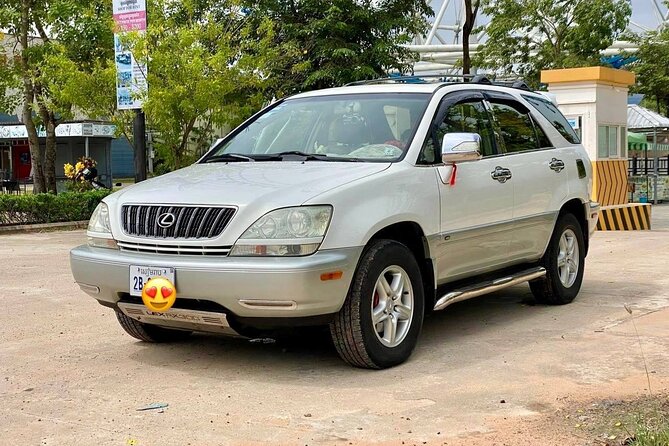 Full Day Tour Phnom Penh to Siem Reap Taxi, Angkor Visit & Return - Bayon and Angkor Thom, faces in the stone