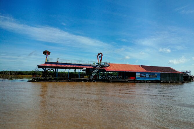 Half-Day Private Sunset Tour In Kampong Phluk From Siem Reap - Temple, church, and school along the route