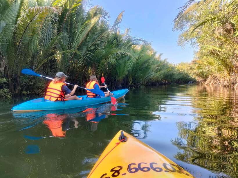 Kayaking tour around green cathedral - The swim and riverside break