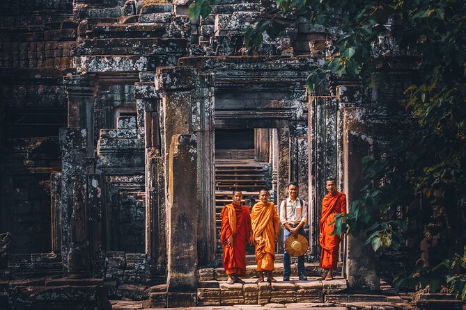 Personalised Angkor Wat Sunrise Tour by TukTuk - Bayon’s stone faces change the mood