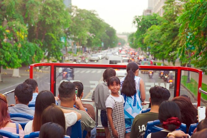 Phnom Penh Hop-on Hop-off Bus with Free Boat Cruise 1 Day Pass - Audio commentary and staff service