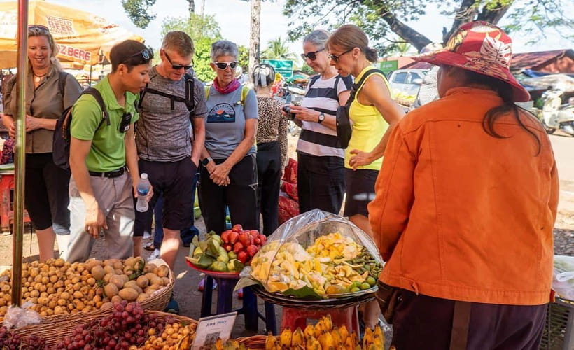 Phnom Penh: Morning Foodie, Market Walking & Street Art Tour - Central Market turns shopping into a lesson