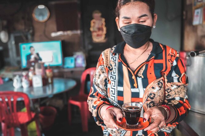 Phnom Penh Morning Market & Food Tour by Tuktuk - Includes All Food & Drinks! - Stop four: yellow turmeric crepes