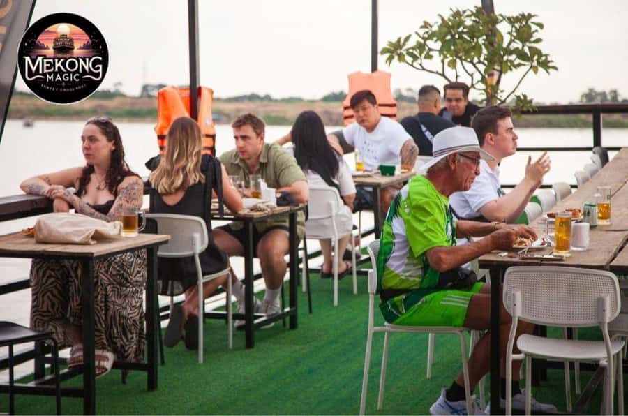 Phnom Penh: Sunset Cruise with Unlimited Beers & BBQ Buffet - Boarding the boat and choosing your package