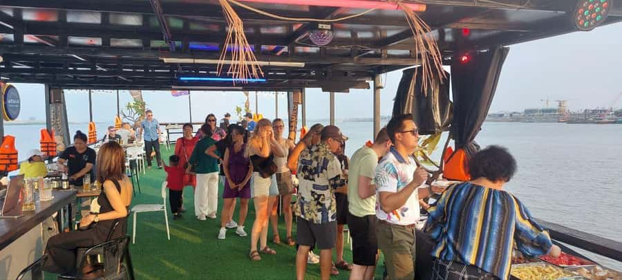 Phnom Penh: Sunset Cruise with Unlimited Beers & BBQ Buffet - Food, drinks, music, and comfort onboard