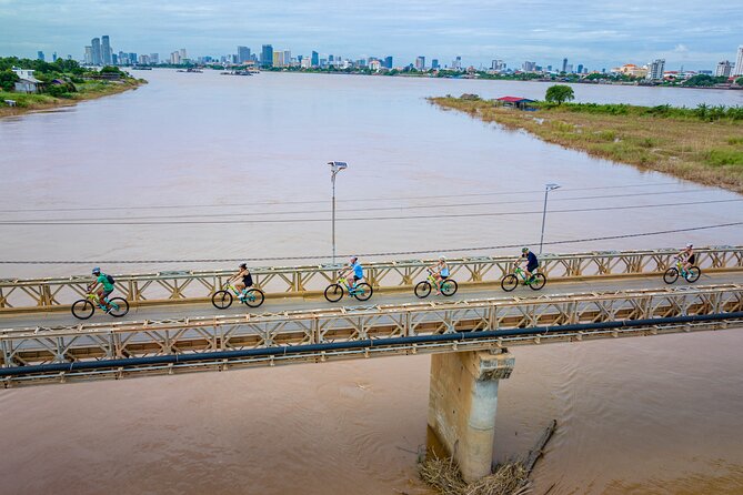 Phnom Penh to Silk Island Sunset Bike Tour/ E-Bike or Tuk Tuk - Mongkol Serey Temple and the first hour