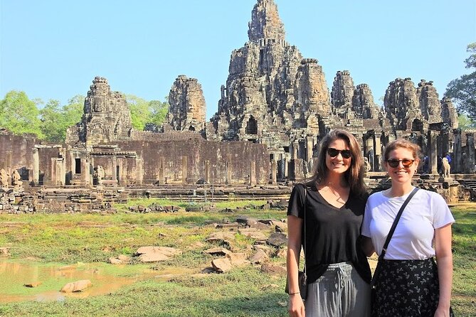 Private 2 Days Angkor Wat Sunrise, Floating Village & Beng Mealea - Bayon gives Angkor Thom its face