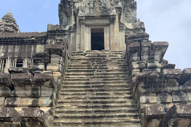 Private Day Trip to Angkor Temples with Expert Guide - Bayon puts faces at the center