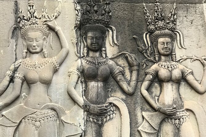 Private Guided Angkor Wat Tour by Lady Tuk Tuk with Monk Blessing - Bayon and its many stone faces