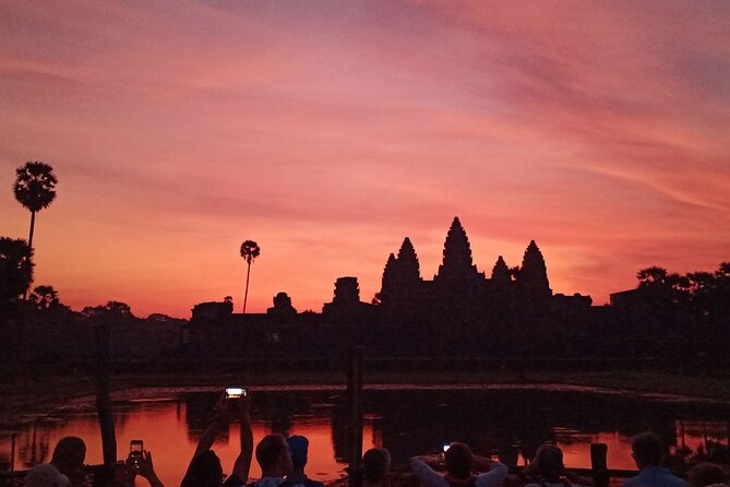 Private One Day Tour with Sunrise at Angkor Wat - Angkor Wat from darkness into morning light