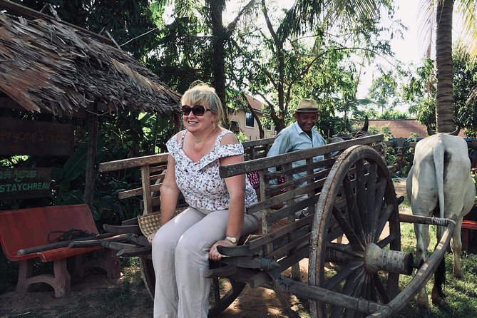 Private Ox Cart Ride and Local village Experience from Siem Reap - Leaving town by air-conditioned vehicle