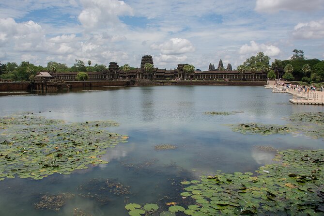 Private Sunrise Angkor Wat Tour with pickup from your hotel - Angkor Thom’s South Gate and the road to Bayon