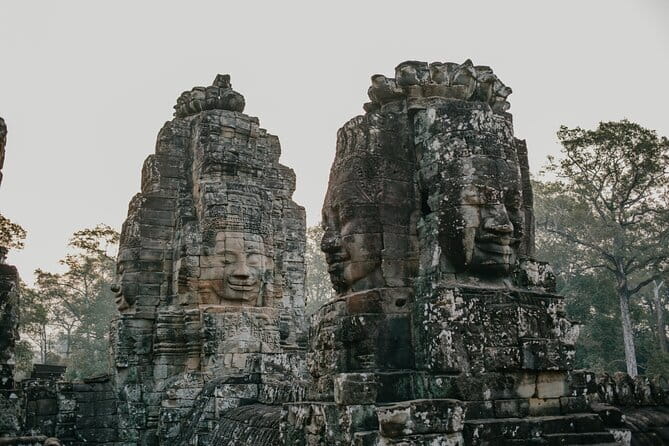 Private Two Days Siem Reap Temples Discovery Guided Tour - Day 1: Angkor Wat, Angkor Thom, and the jungle temples