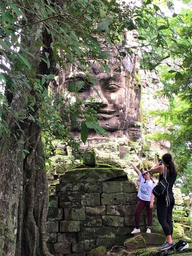 Siem Reap: Angkor Wat, Bayon & Ta Prohm Guided Tour - Angkor Thom: a change from temple to city