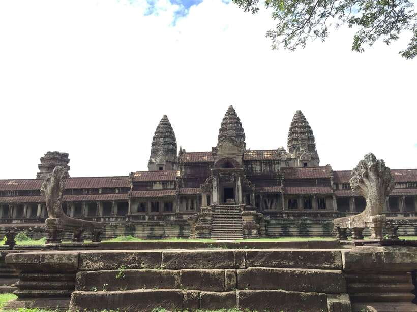 Siem Reap: Angkor Wat Half-Day Trip with Local Guide - The first view across Angkor Wat’s lotus pond