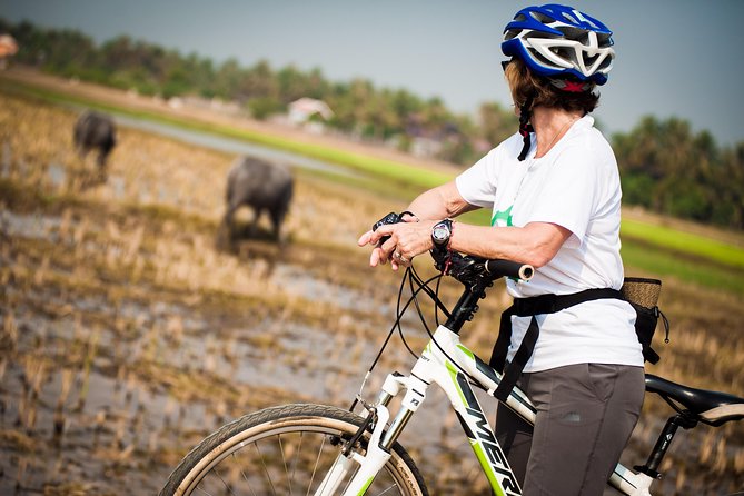 Siem Reap Countryside Guided Tour by Bike and E-Bike Private Tour - Snacks, village homes, and ordinary rural work