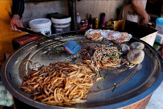 Siem Reap Food Tour By Local - Stop five: sticky rice, market desserts, and drinks