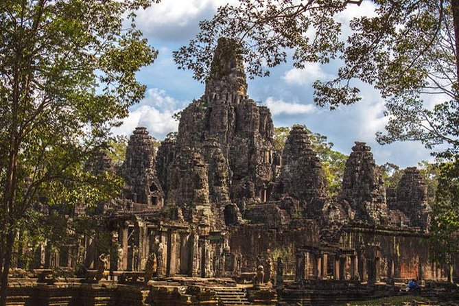 Siem Reap Full Day Angkor Wat Tour Small Group - Ta Prohm, roots, ruins, and a shorter final stop