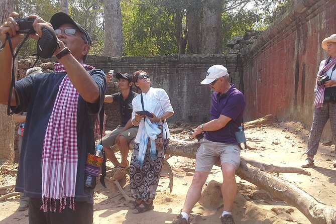 Sun Rise at Angkor Wat Small Group Day Tour from Siem Reap - Bayon’s stone faces and crowded galleries