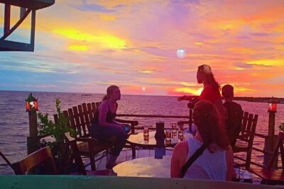 Sunset Dinner and drinks includes a Floating Village cruise tour.