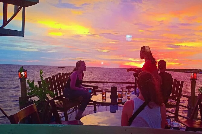 Sunset Dinner and drinks includes a Floating Village cruise tour. - The move to the Queen Tara restaurant
